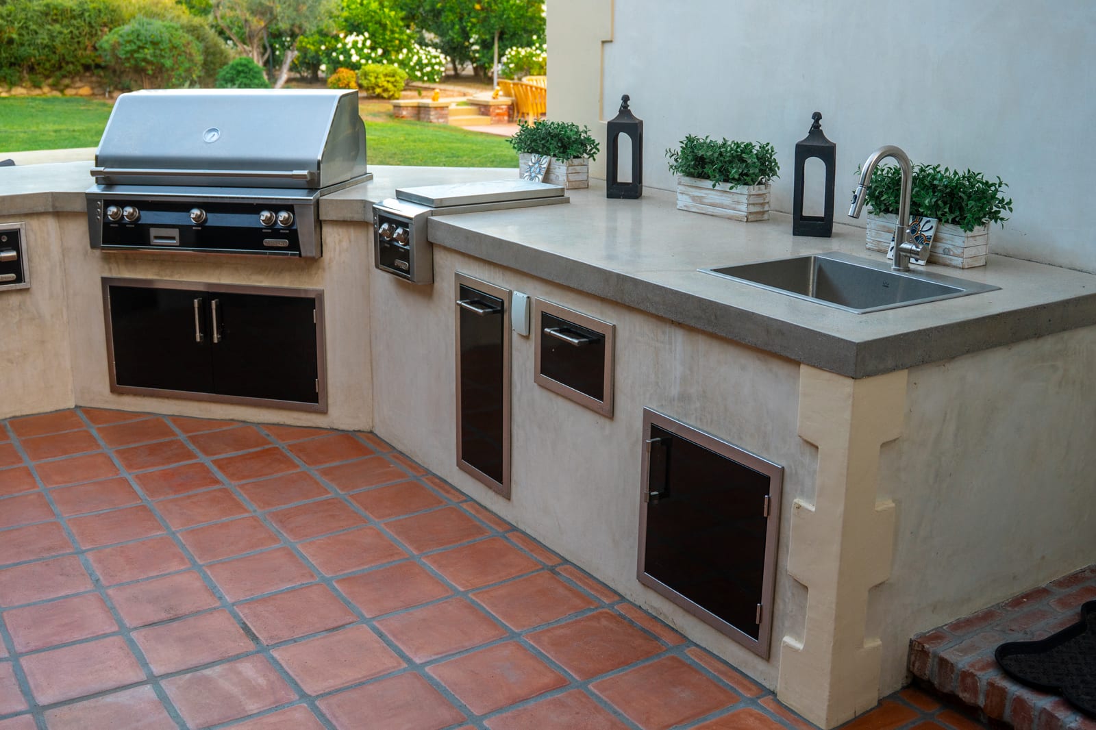 Spanish Estate built-in outdoor kitchen with grill and sink